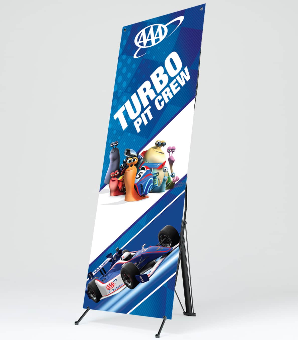 A vertical pull-up banner for a 'TURBO PIT CREW' event featuring animated characters and images of a race car, with AAA branding at the top.