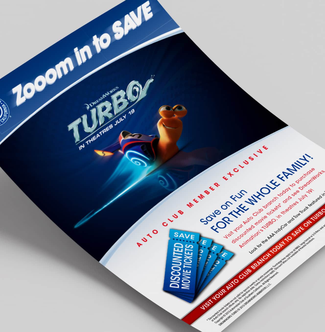 A flyer tilted to the side, advertising a savings deal for an event called 'TURBO' with a graphic of an animated snail and tagline 'Zoom into SAVE'.